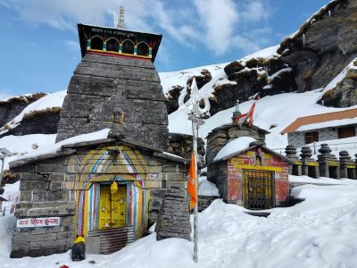 Tungnath Temple covered in winter snow, Uttarakhand, India. A serene and spiritual landmark.